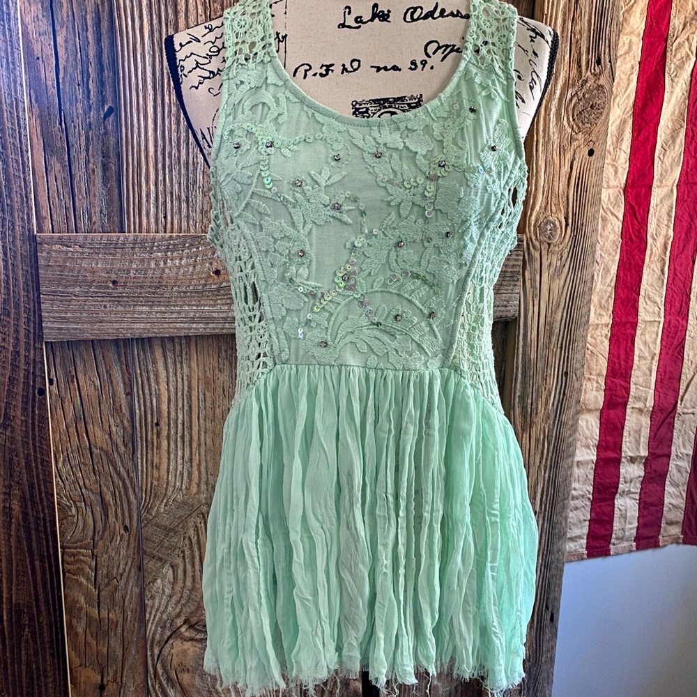 EUC BKE mint green raw hem sequined top